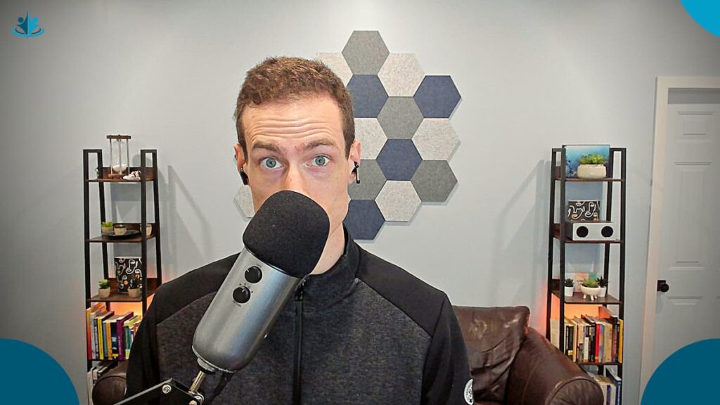 Stuart Cameron MSW, RSW demonstrating his Blue Yeti microphone for remote online therapy